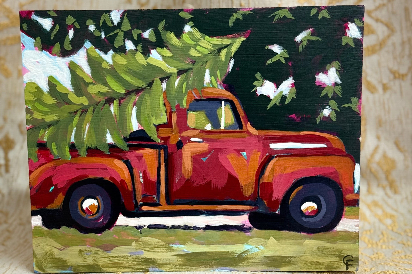Painting of a vintage truck with a Christmas tree on a textured surface